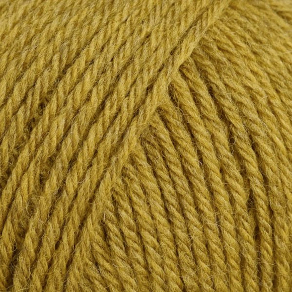 up close skein of lanas light yarn color yellow