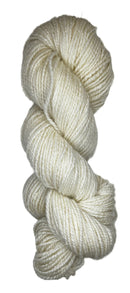 A handspun skein of angora merino yarn in a natural white color