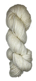 A handspun skein of angora merino yarn in a natural white color