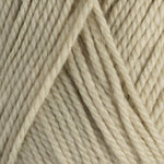 Close-up of beige yarn with a textured pattern
