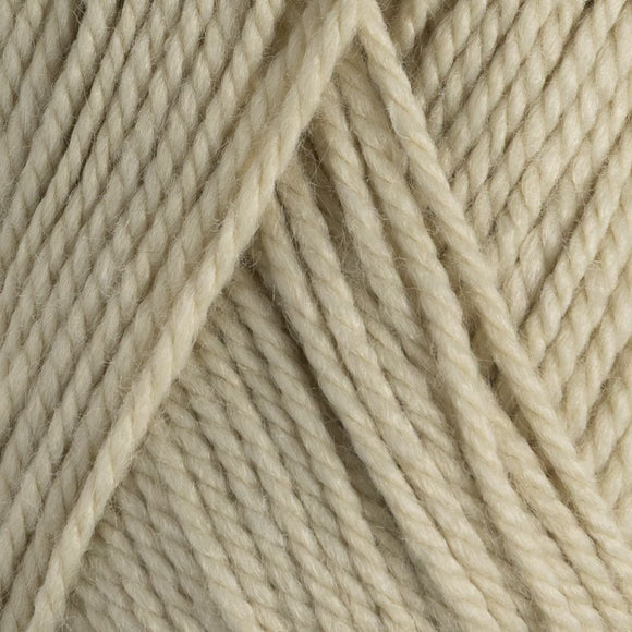 Close-up of beige yarn with a textured pattern