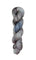 A skein of hand-dyed fingering/sock yarn color grey blue black speckles