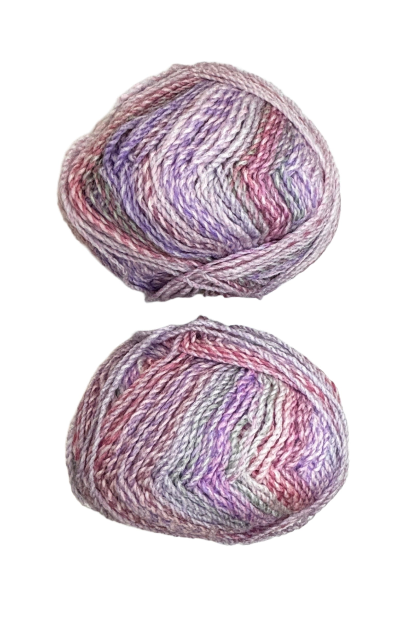 A variegated skein of yarn in the colors pink white grey mauve purple
