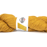 Mustard yellow skein of yarn with a label on a white background