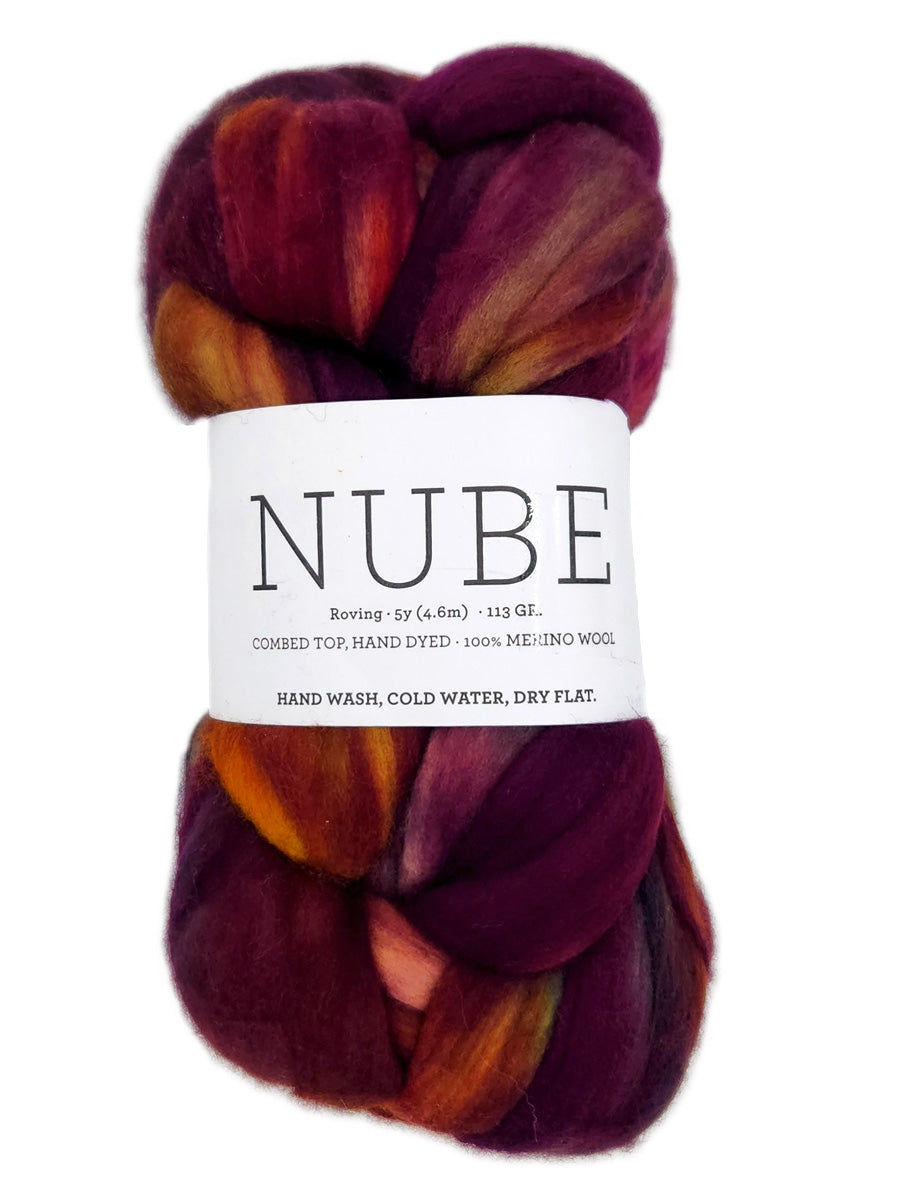 A photo of the purple, yellow, and red Nube fiber braid
