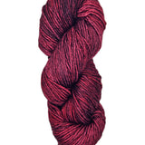 A hank of dark red yarn by Malabrigo Rios yarn