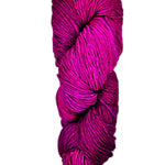 A hank of magenta yarn by Malabrigo Rios yarn