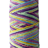 Pastel Pink, Blue, Yellow, Purple striped skein of yarn