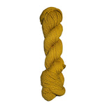Yellow skein of mountain meadow wool yarn on a white background