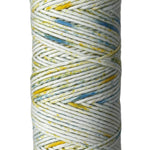Yellow and Blue speckled skein of yarn 