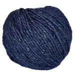 Ball of mildly tweedy yarn color midnight blue
