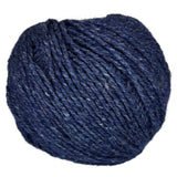 Ball of mildly tweedy yarn color midnight blue