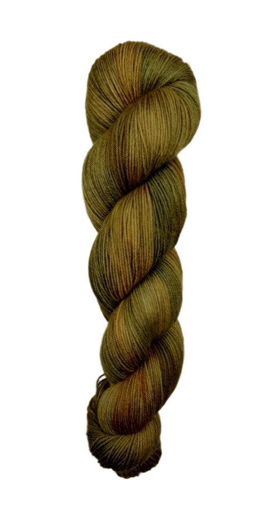 A skein of hand-dyed fingering/sock yarn color brown tan black