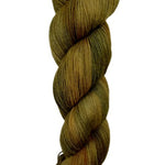 A skein of hand-dyed fingering/sock yarn color brown tan black