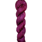 Skein of hand dyed BFL Tweed Yarn color wine red