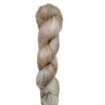 Skein of superkid mohair silk lace weight yarn color off white