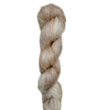 Skein of superkid mohair silk lace weight yarn color off white