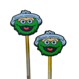 Two stitch stoppers with osdar the grouch designs on wooden needles