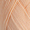 Close-up of peach-colored yarn