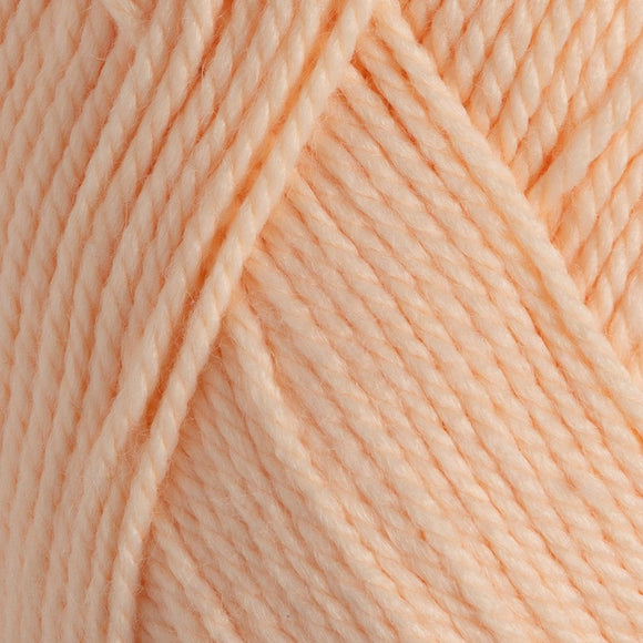 Close-up of peach-colored yarn