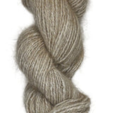 A skein of handspun angora yarn in a cream natural color