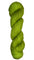 Skein of hand dyed fingering weight yarn in the color pea green 