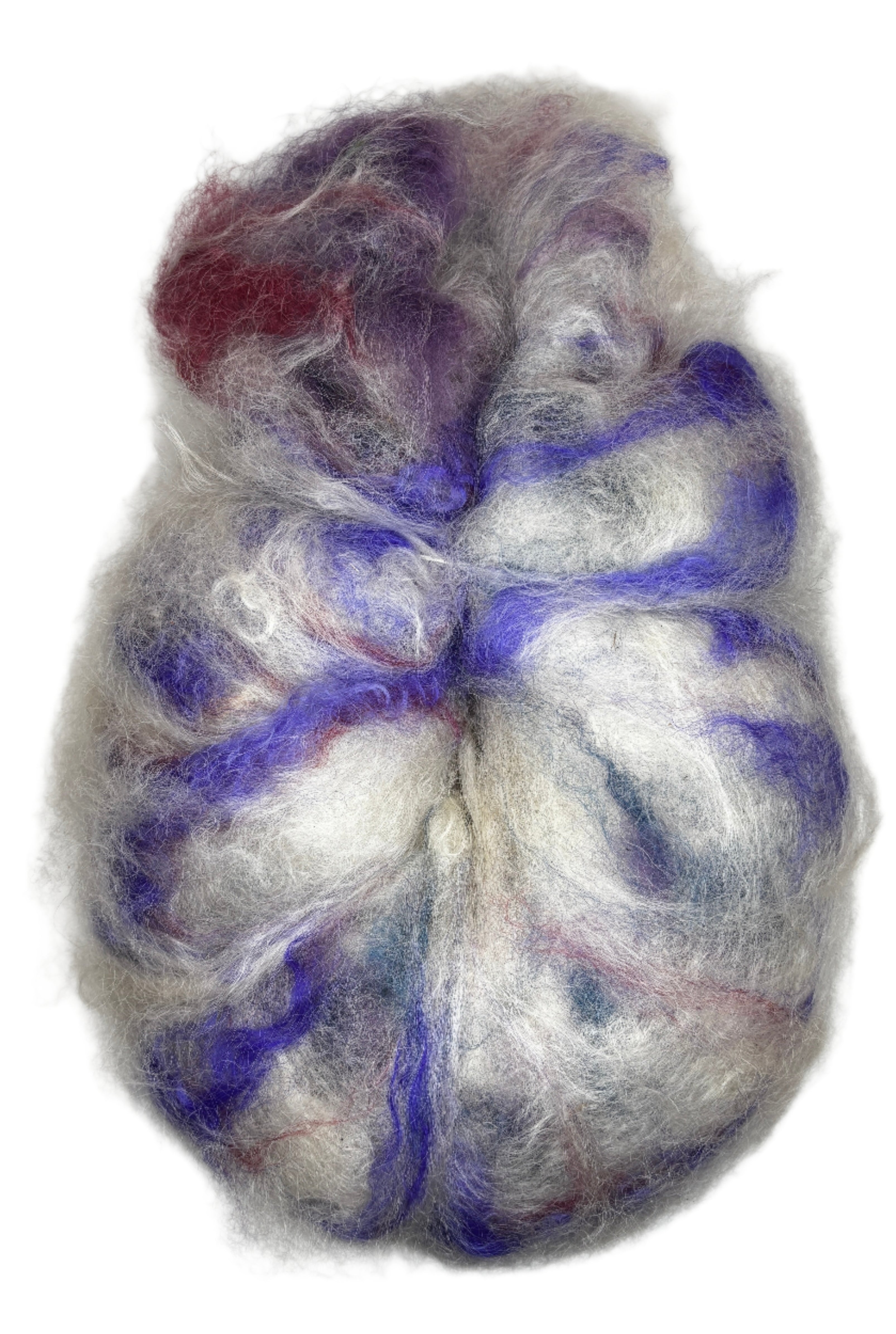 A rolag of wool fiber ready to spin in the colors natural white purple red blue 