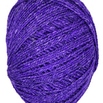 A bright purple skein of Queensland Collection Kathmandu yarn