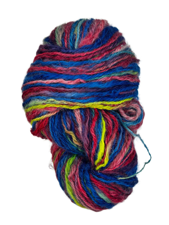 Handspun skein of rainbow yarn 