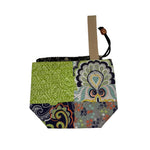 Fabric patchwork drawstring bag with various patterns on a white background