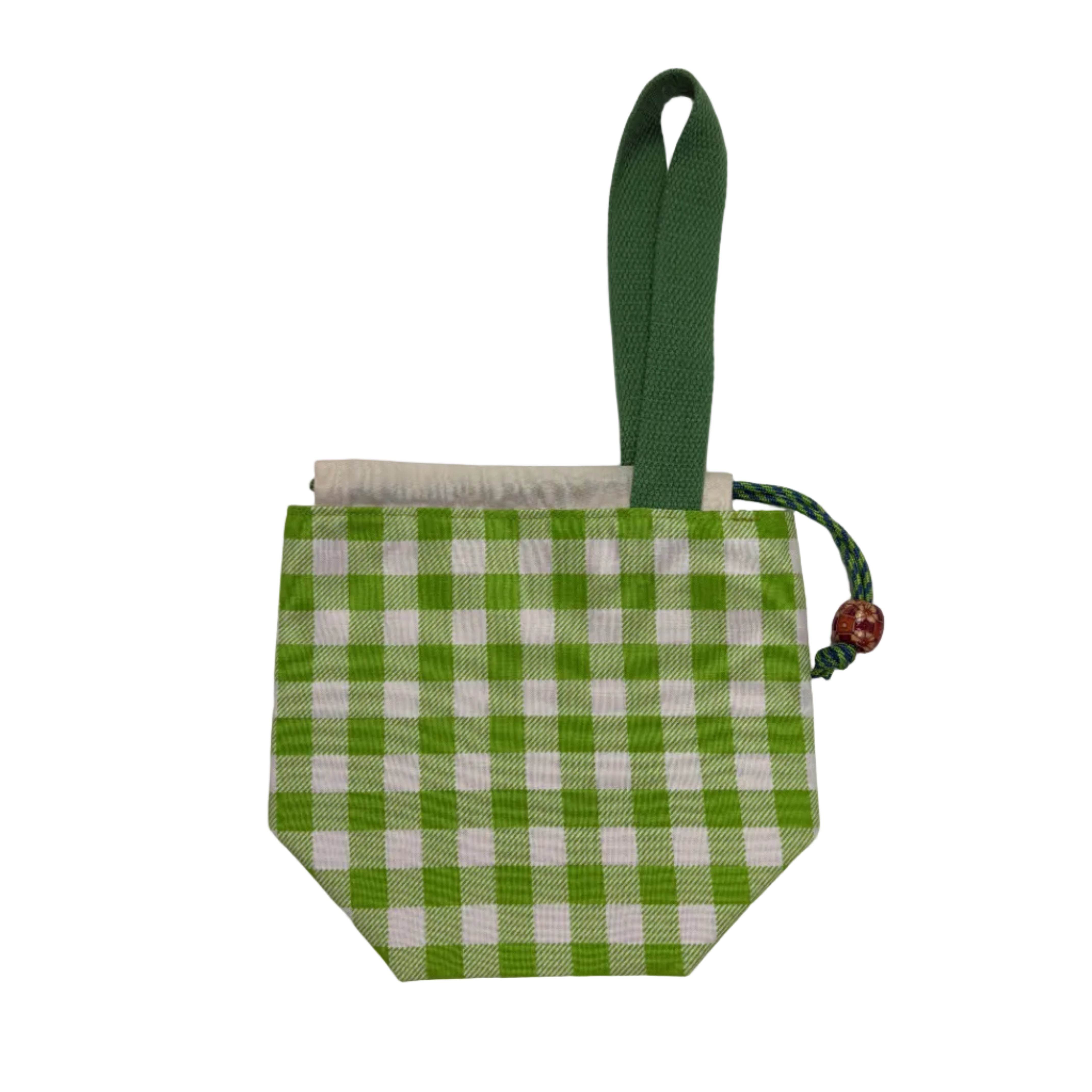 A small fabric pouch with a green and white gingham pattern, featuring a green woven handle and a drawstring closure with a small red bead