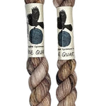 Two mini skeins of wool yarn hand dyed in Wyoming in the color pink brown speckles