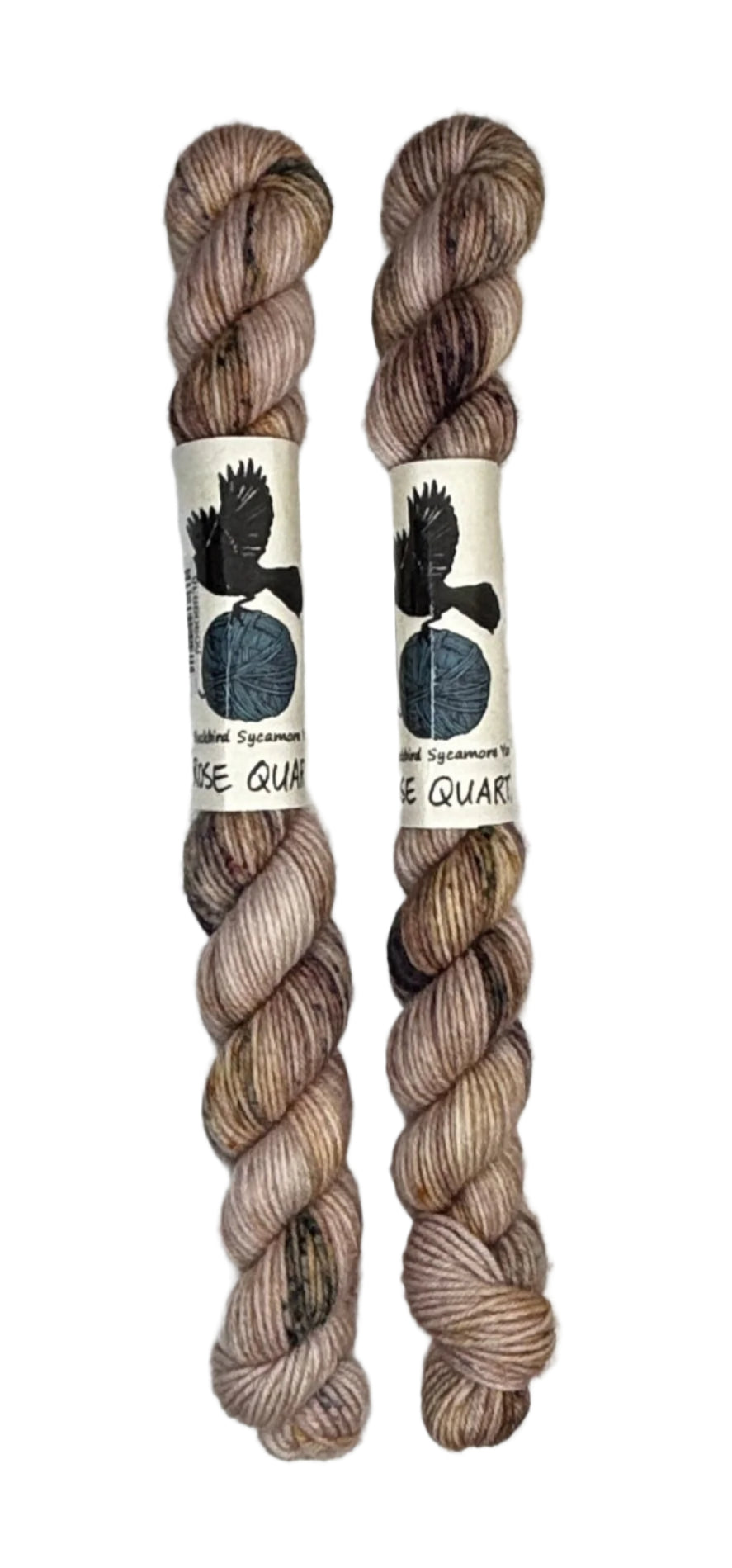 Two mini skeins of wool yarn hand dyed in Wyoming in the color pink brown speckles