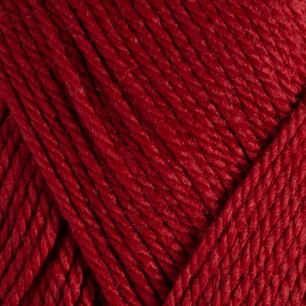 Close-up of red yarn with a textured pattern