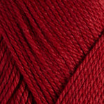 Close-up of red yarn with a textured pattern