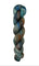 A skein of hand-dyed fingering/sock yarn color grey blue orange brown red black speckles