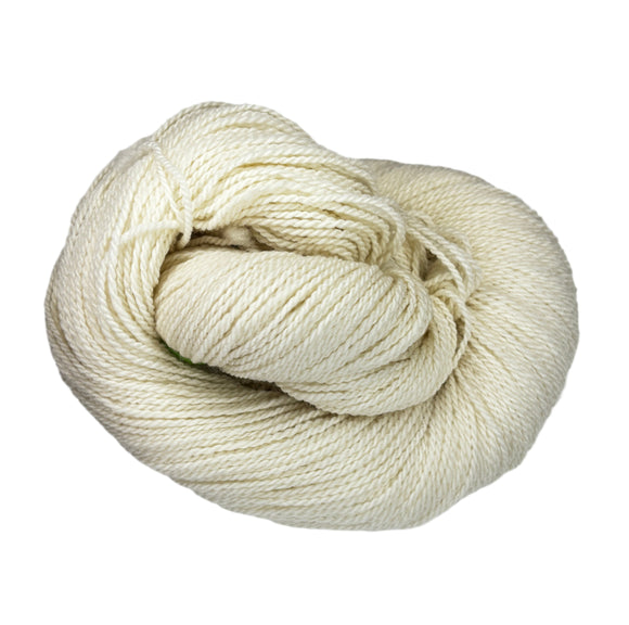 A ball of Mountain Meadow Wool Yarn in the color natural