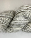 Handspun skein of Angora and Wool Yarn color grey and white