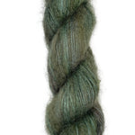 Hand dyed skein of silk mohair in the colors green brown black