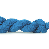 Blue skein of yarn on a white background