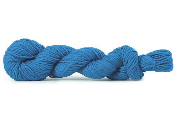 Blue skein of yarn on a white background
