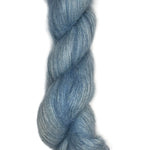 Skein of hand dyed mohair silk in the color sky blue