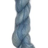 Skein of hand dyed mohair silk in the color sky blue