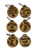 Small wooden stitch markers with decorative engraving