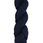 Dark Navy Blue skein of mountain meadow wool yarn on a white background