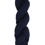 Dark Navy Blue skein of mountain meadow wool yarn on a white background