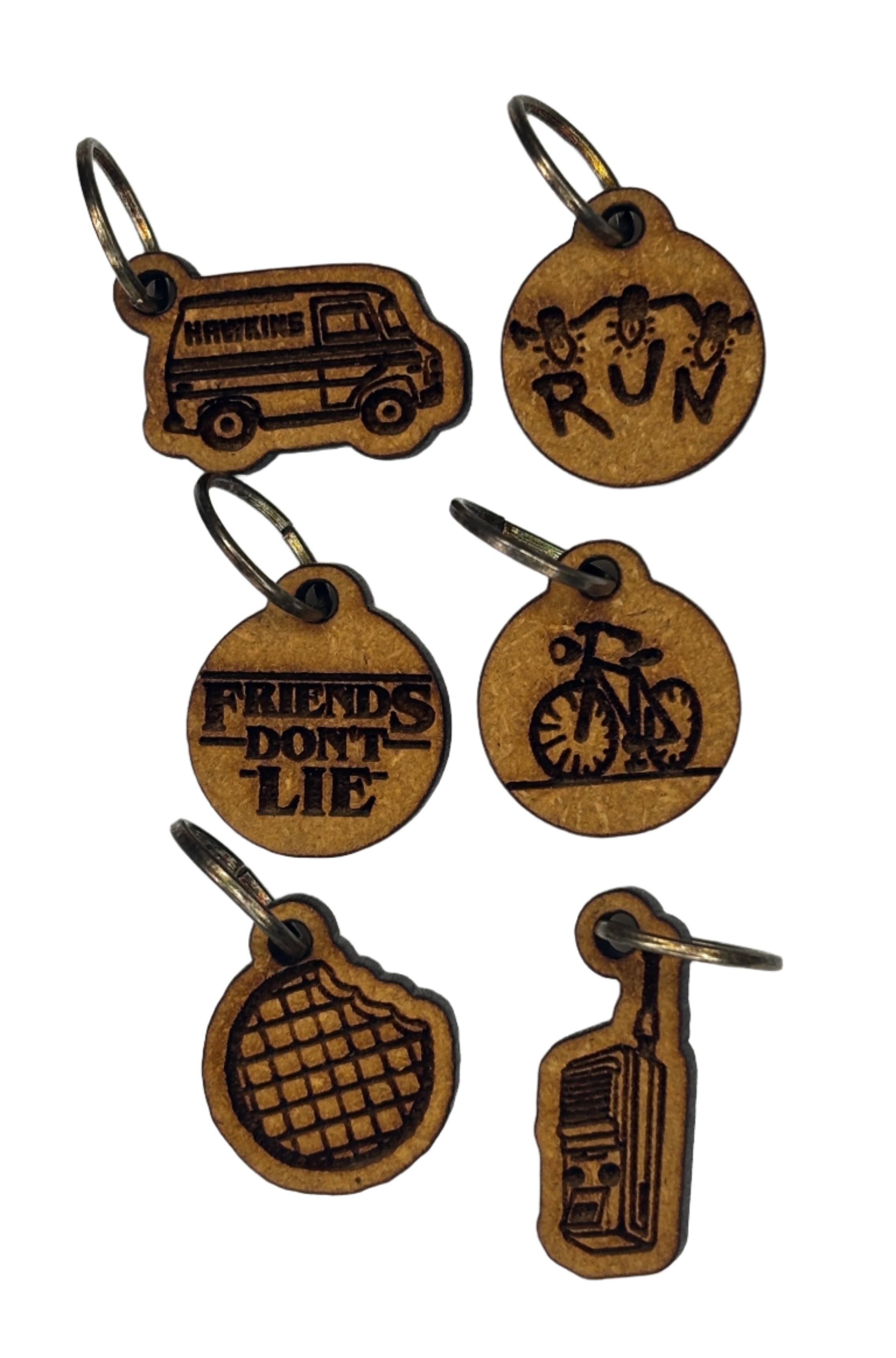 Small wooden stitch markers with decorative Stranger Things engraving