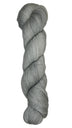 Skein of hand dyed fingering weight yarn in the color grey