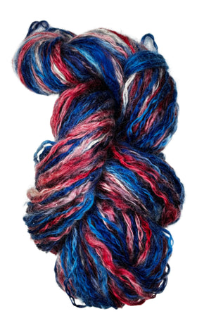 Skein of handspun handdyed yarn from Tronstad Ranch in Wyoming in the colors red white blue