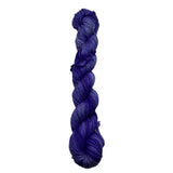 Braided blue yarn on a white background